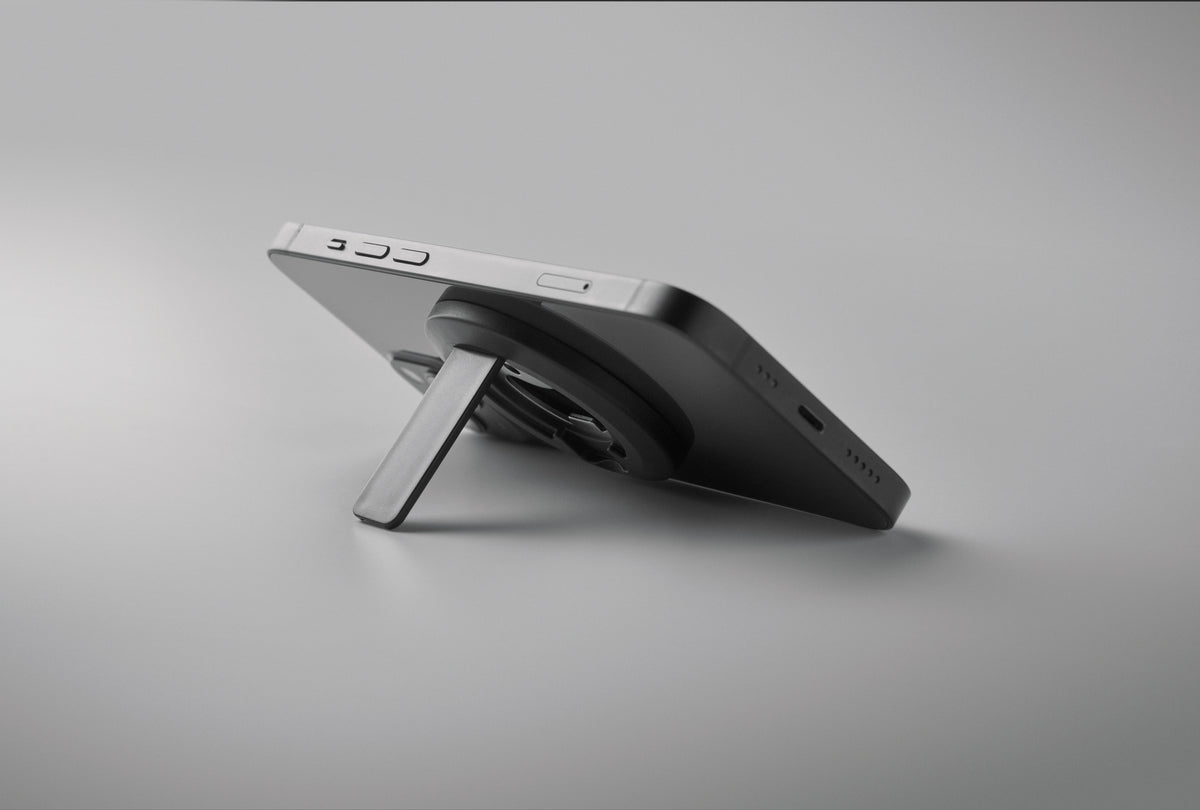 DOSENUNO – Phone holder and bottle opener – item picture top